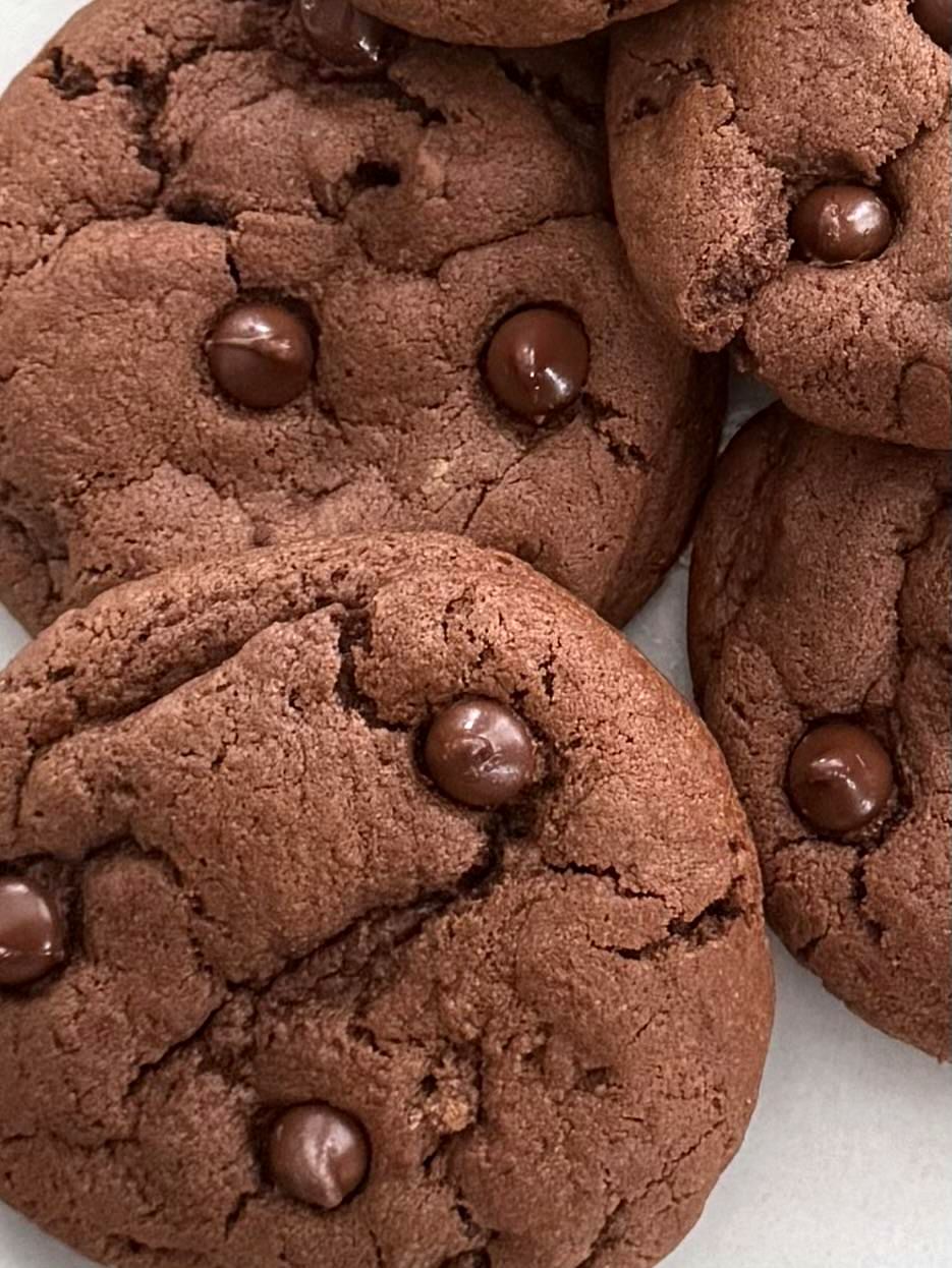 close-up of double chocolate chip protein cookies