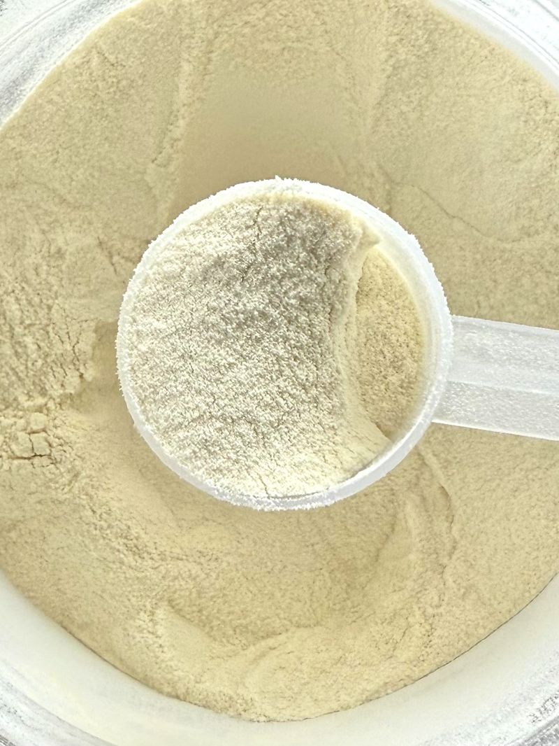scoop of grass-fed whey protein powder